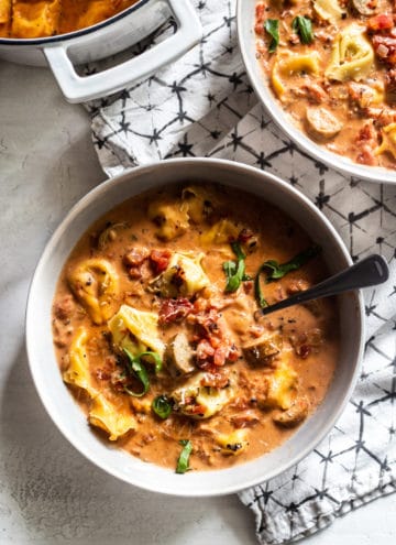 This Sausage Tortellini Soup comes together quickly with a rich and creamy tomato base, Italian chicken sausage and cheese tortellini.